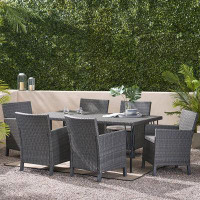 Orren Ellis Luray Outdoor Wicker 7 Piece Dining Set with Cushions