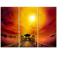 Design Art Exotic Wood Pier under Yellow Sun - 3 Piece Graphic Art on Wrapped Canvas Set