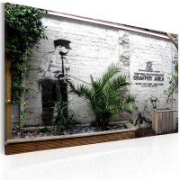 Latitude Run® Stretched Canvas Street Art - Banksy Graffiti Area With Plants