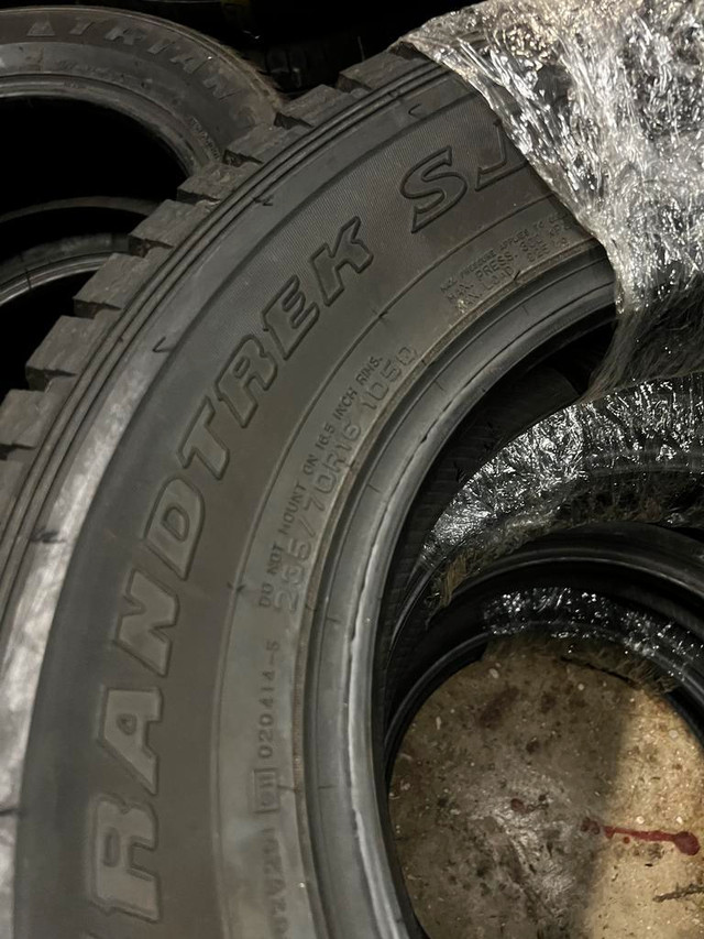 FOUR NEW 235 70 R16 DUNLOP GRANDTREK SJ6 WINTER ICE in Tires & Rims in Toronto (GTA) - Image 3