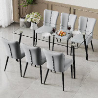 Latitude Run® Sleek Metal and Glass  Dining Table Set with 6 PU Leather Upholstered Dining Chairs
