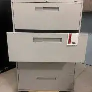 Global 4 Drawer Lateral Filing Cabinet Pre-owned Color: Grey Center Pull Handles Dimensions: 36W x 1...