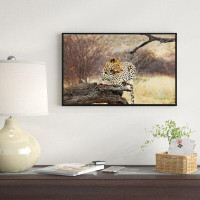 Made in Canada - East Urban Home Leopard Sitting on Tree Trunk - Photograph Print