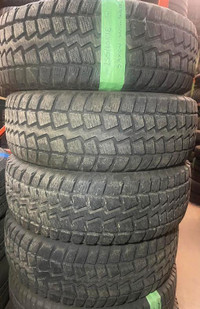 USED SET OF WINTER SAXON 235/65R18 75% TREAD WITH INSTALL.