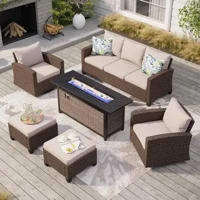 The 8-piece of wicker patio furniture set with a fire pit table is the ultimate addition to any outd...