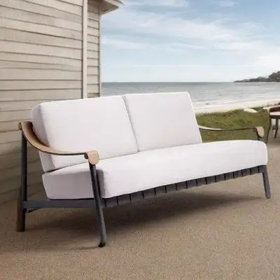 This outdoor sofa features an aluminum frame with a bamboo rattan finish. It includes high-elasticit...