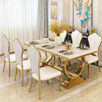 RARLON 7-Piece gold stainless steel base dining set.