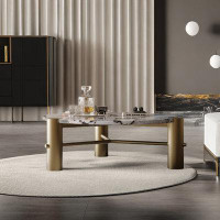 Everly Quinn Light luxury minimalist round coffee table.