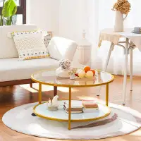 Everly Quinn 3 Legs Round Glass Coffee Table With Storage