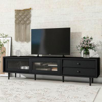 Ebern Designs Modern TV Cabinet with Sliding Fluted Glass Doors and Slanted Drawers TVs Up to 75"
