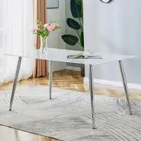 Wrought Studio rectangular dining table with imitation marble tabletop and silver metal legs